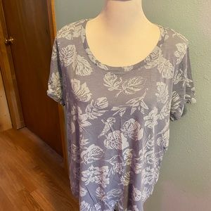 1XL light blue print top , Chelsea and Theodore. $15 gently used